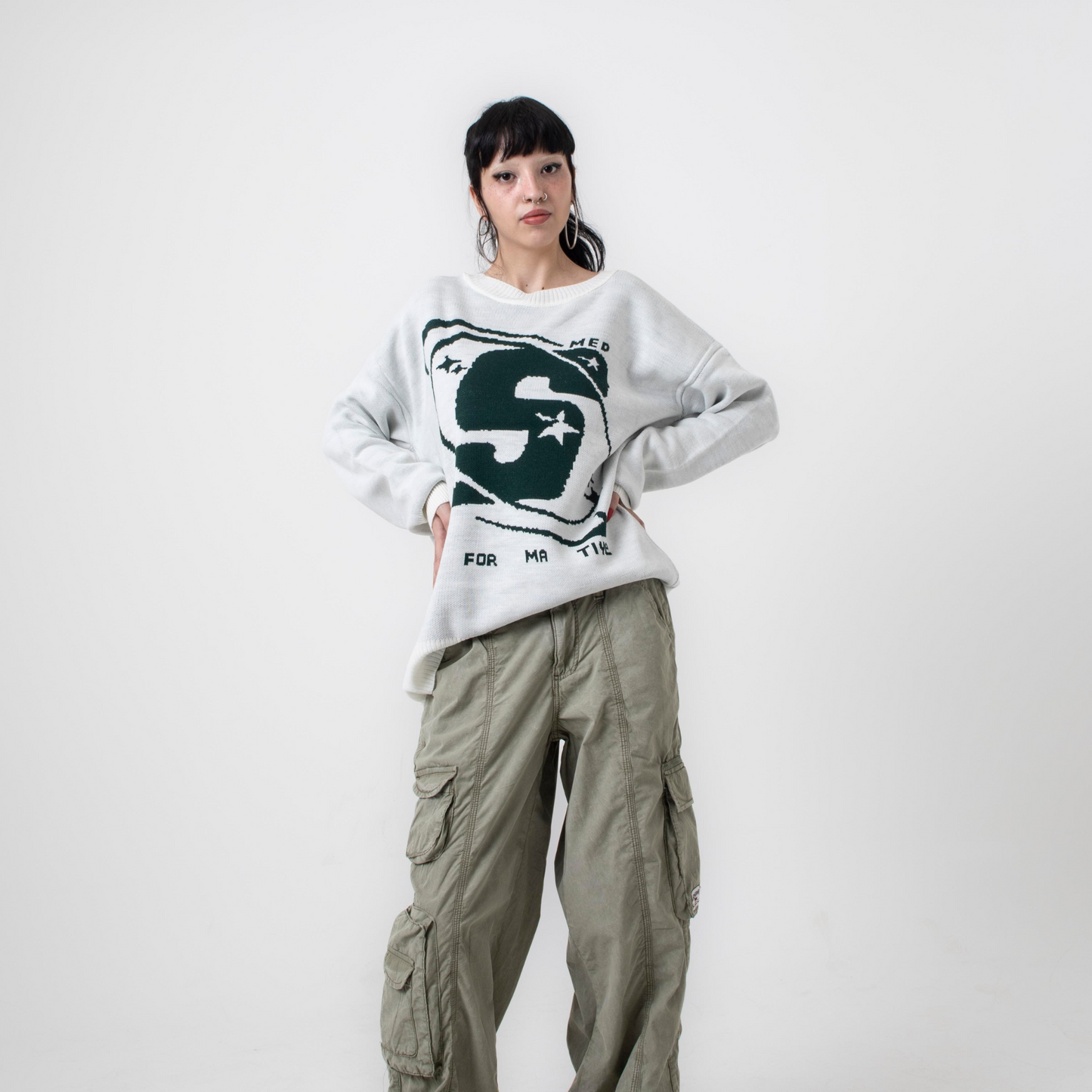 Street-Style Beige Sweater with Green "S" Logo